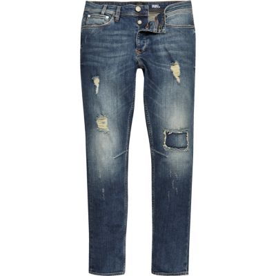 Mid blue wash ripped Sid skinny stretch jeans
